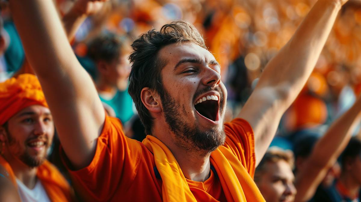 Juichende Oranje-supporters in het stadion