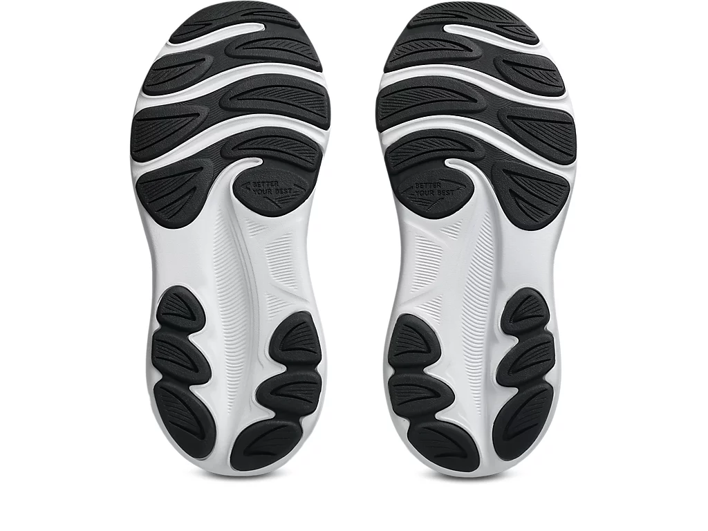 Onderkant van de Asics Gel-Contend 9 GS kinderschoen met massief rubberen buitenzool en flexgroeven.