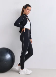 Aim'n Black Sense Contrast Tights 25030689-010 dames sportlegging in het zwart met stijlvolle contrastdetails en hoge taille