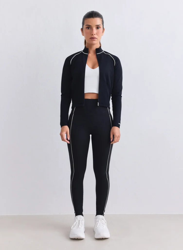 Aim'n Black Sense Contrast Tights 25030689-010 dames sportlegging in het zwart met stijlvolle contrastdetails en hoge taille