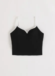 Aim'n Sense Contour Singlet 26041554-010 dames sporttop in het zwart met accentuerende contourlijnen