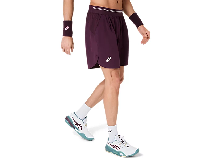 Vooraanzicht van de paars-rode Cassis Asics Game 7 Inch heren sportshort
