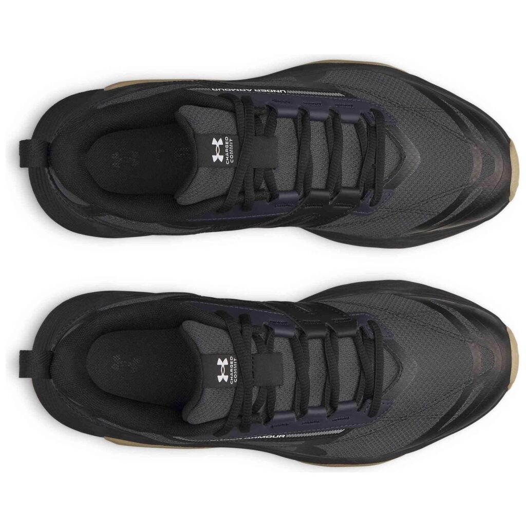 Under Armour Charged Commit TR 5 fitnesstrainers voor heren in het zwart (6007140-016) met platte zool en verstevigde hielkap