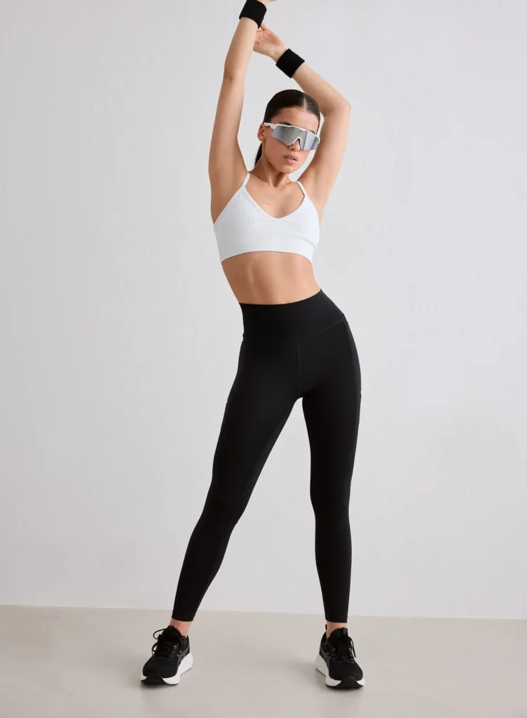 Aim'n Black Running Tights comfortabele en ondersteunende zwarte dames hardlooptight