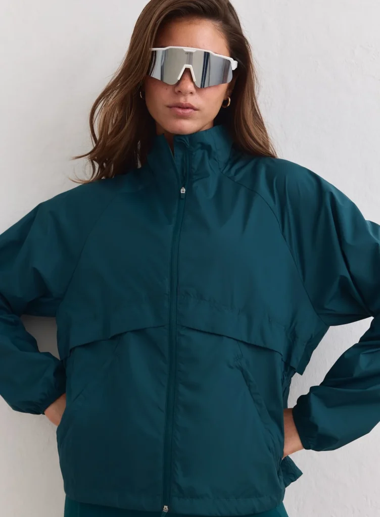 Aim'n Lagoon Running Jacket lichtgewicht en windafstotend blauw dames hardloopjack